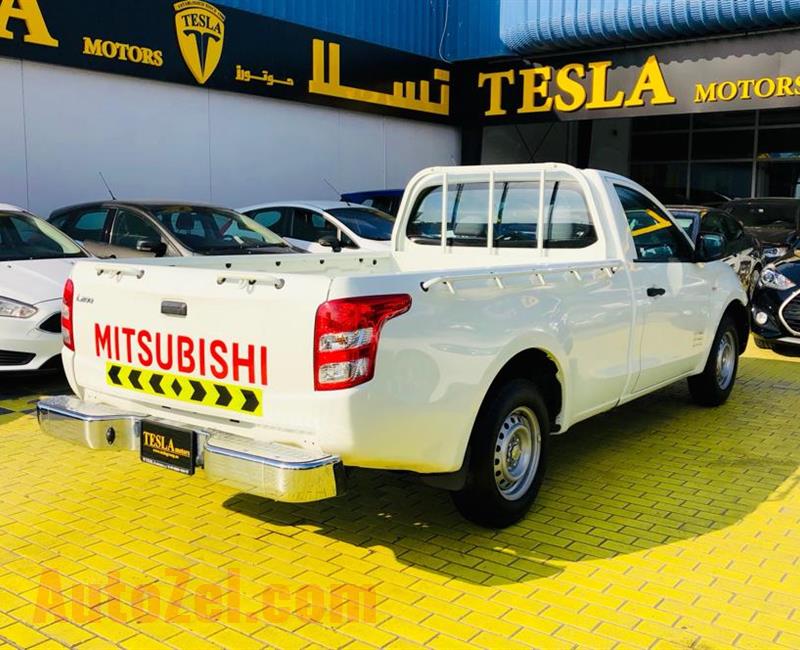 ///LOW MILLAGE///MITSUBISHI L200///2016///GCC///WARRANTY///LIKE BRAND NEW///ONLY 633 DHS MONTHLY///
