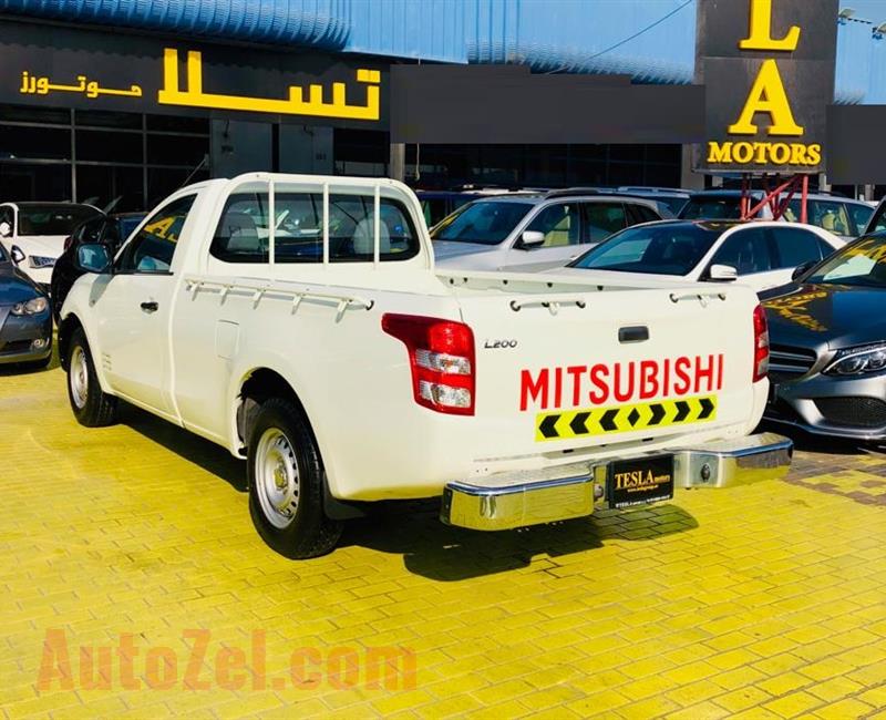///LOW MILLAGE///MITSUBISHI L200///2016///GCC///WARRANTY///LIKE BRAND NEW///ONLY 633 DHS MONTHLY///