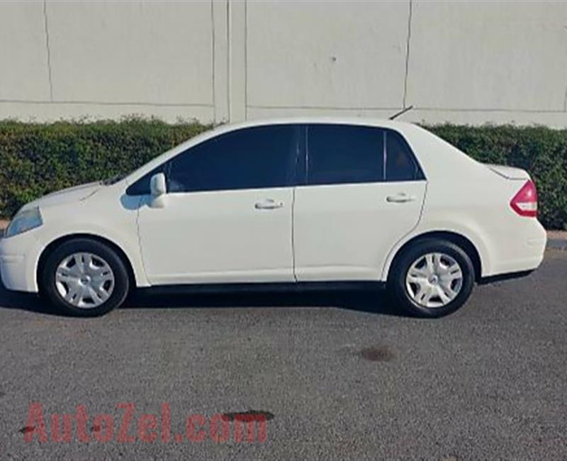 Nissan Tiida 2009 Family CAR,  in Excellent condition. Fully Automatic, Engine, gear and Chassis guranteed Insha Allah.  Location- Ajman   