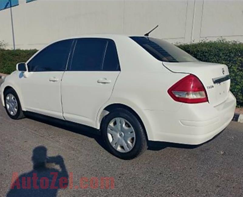 Nissan Tiida 2009 Family CAR,  in Excellent condition. Fully Automatic, Engine, gear and Chassis guranteed Insha Allah.  Location- Ajman   